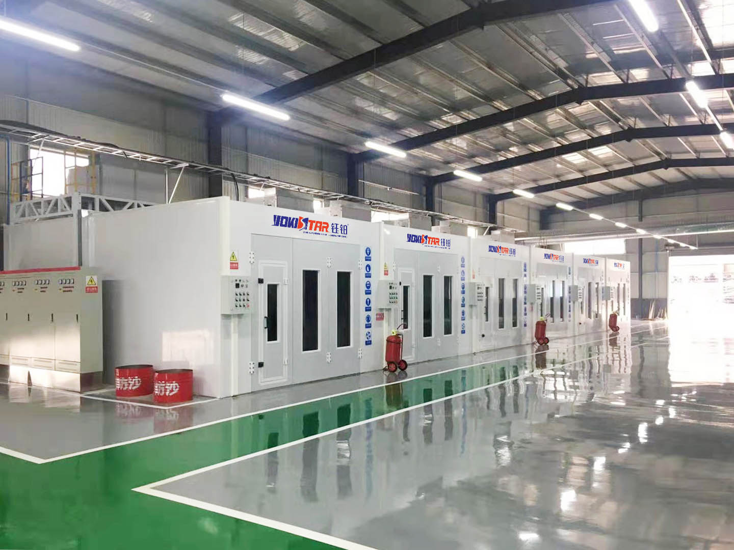 a production line of spray paint sheet metal