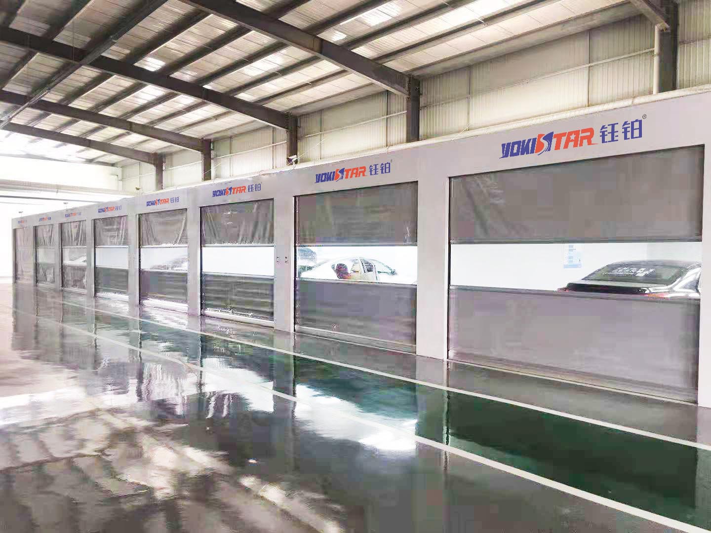 a production line of spray paint sheet metal